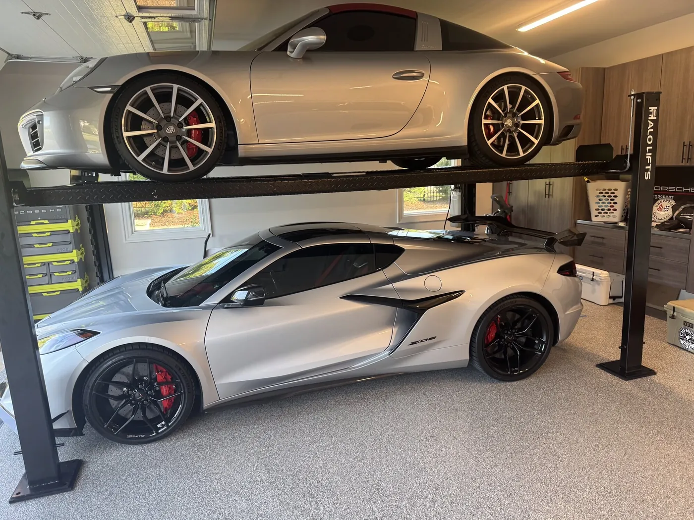 Custom garage build with a two-level car lift in Greenville SC