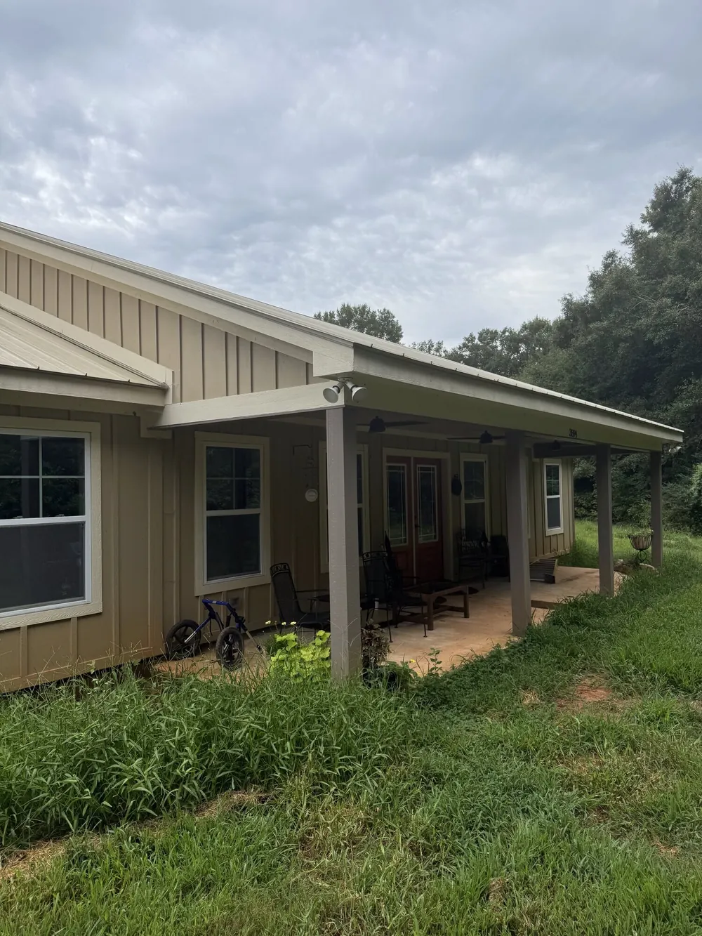 Home with a covered porch built in Greenville SC